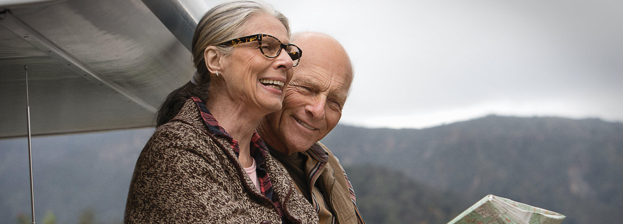 Happy older couple exploring outdoors